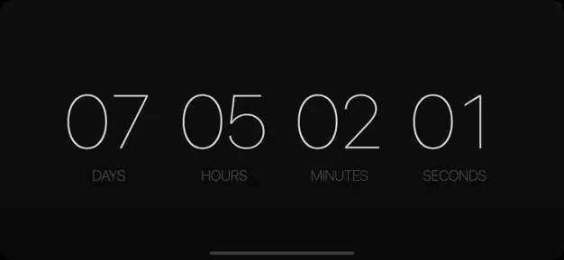 Countdown timer app main display showing 07 days, 05 hours, 02 minutes, 01 seconds with labeled time units on dark background
