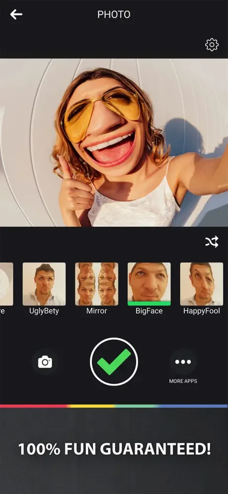 Funny Camera Filters app displaying oversized sunglasses filter with exaggerated smile and filter selection thumbnails