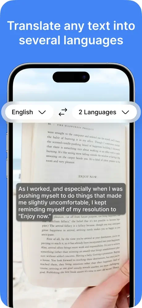 Text translator scanning book page with English source language and multi-language translation conversion options displayed