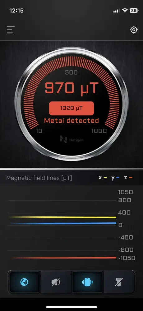Smart Metal Detector app alert showing metal detected with 970 microtesla reading and multi-axis graph