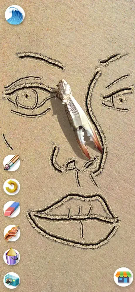 Sand Draw gameplay featuring face drawn in sand with detailed facial features and decorative brush tool for creating art