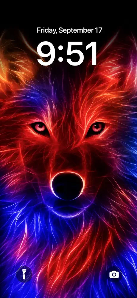 Glowing neon wolf head wallpaper with red and blue fur effects for iPhone lock screen background