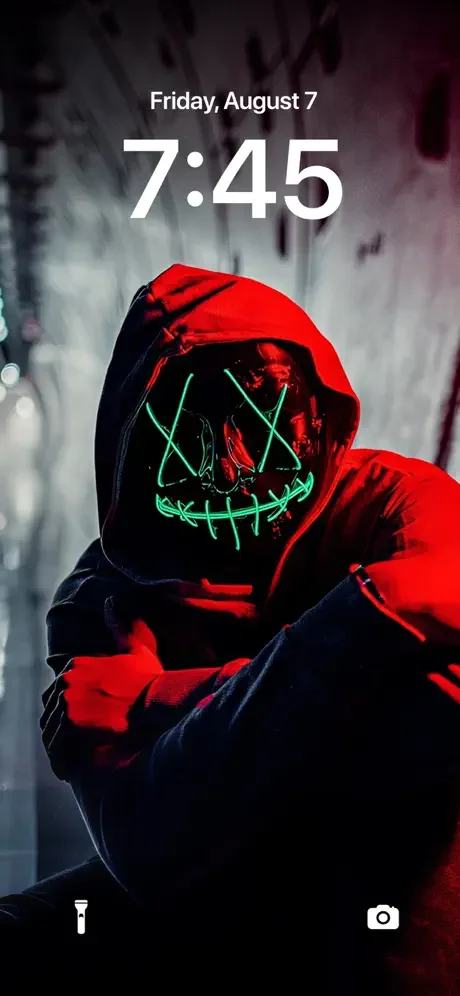 Dark neon masked figure wallpaper with glowing red and green face design on lock screen showing Friday August 7 at 7:45